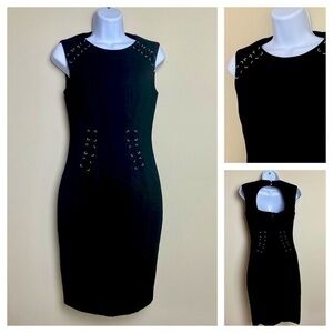 NWOT Cache form fitting black sleeveless dress. Stretch. Size 2